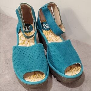 Fly London Yake Perforated
Leather Wedge Sandals Women
36 US 5.5-6 Teal Blue